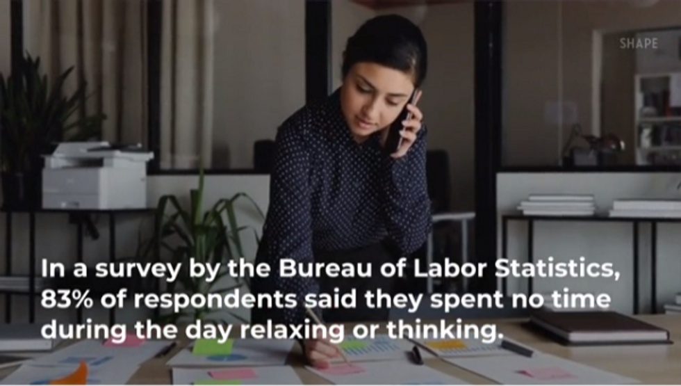 a photo of a woman on the phone working from home with a quote from Bureau of Labor