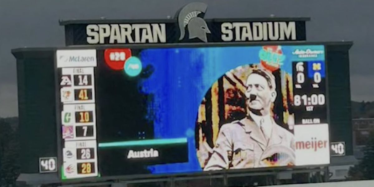 NextImg:'Disgusting display': Adolf Hitler image shown at Michigan State football stadium for trivia question; employee suspended