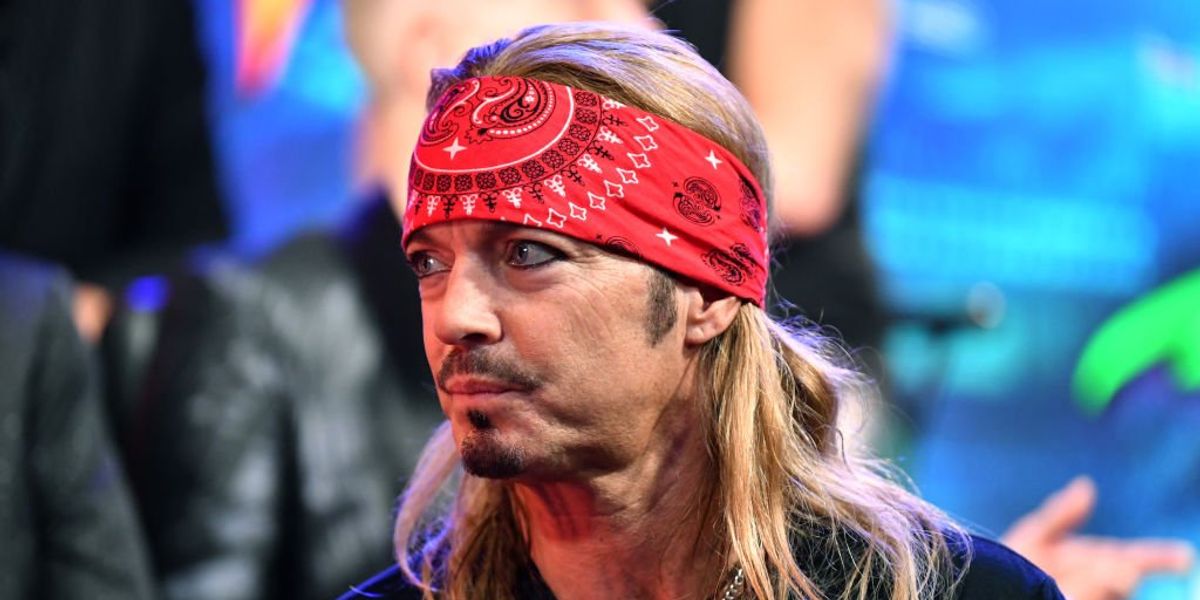 NextImg:Rocker Bret Michaels adopts dog named Bret Michaels after the canine's blood was transfused into an ailing kitten