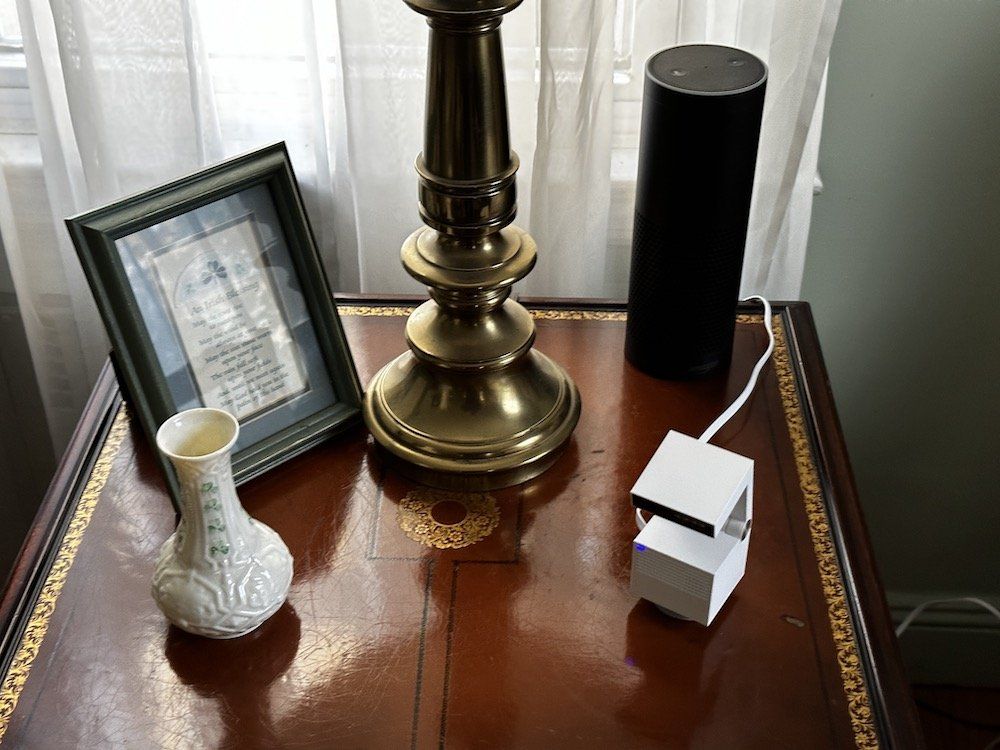 Psync Camera Genie S on an end table