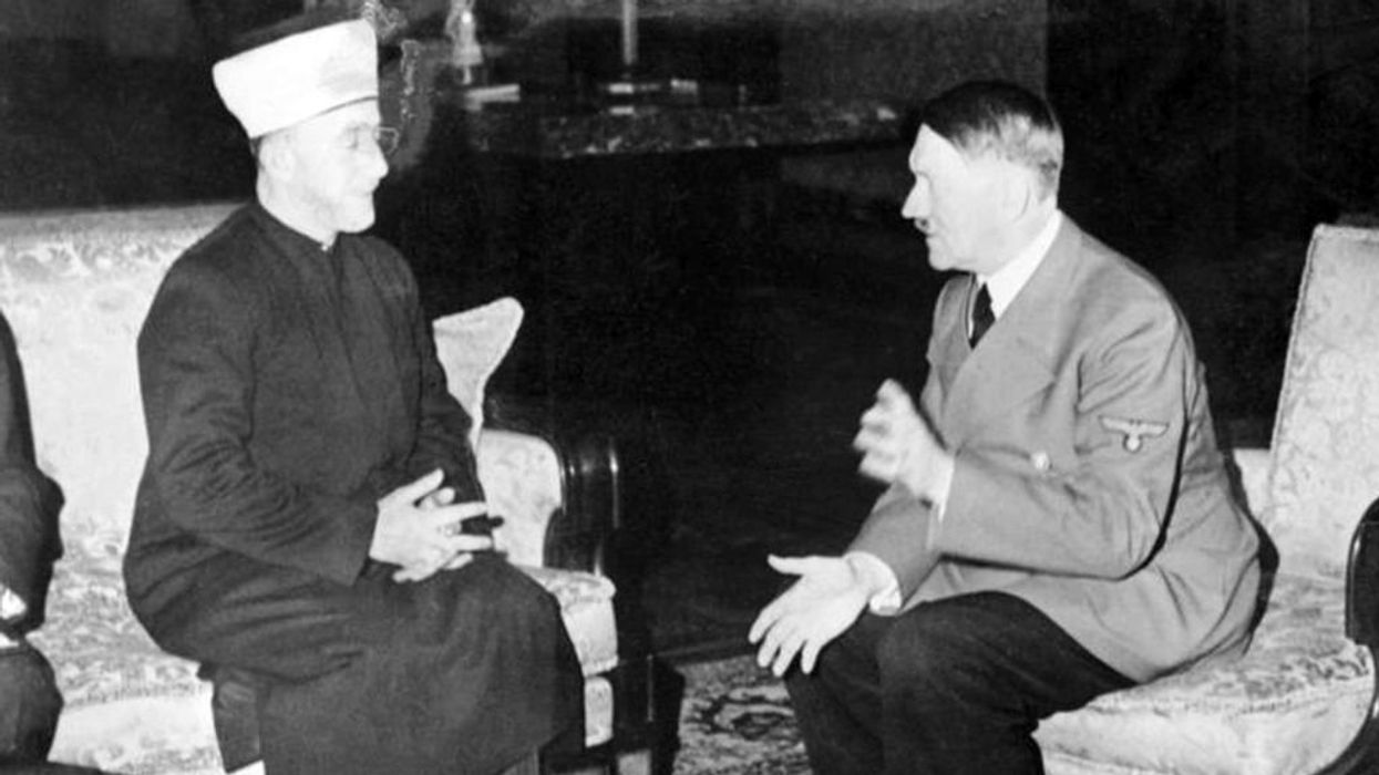 Haj Amin al-Husseini meets with Adolf Hitler to discuss how to resolve the "Jewish problem."