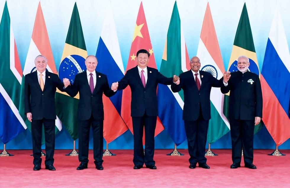 Putin, Xi, and other world leaders gather at the South African BRICS summit.