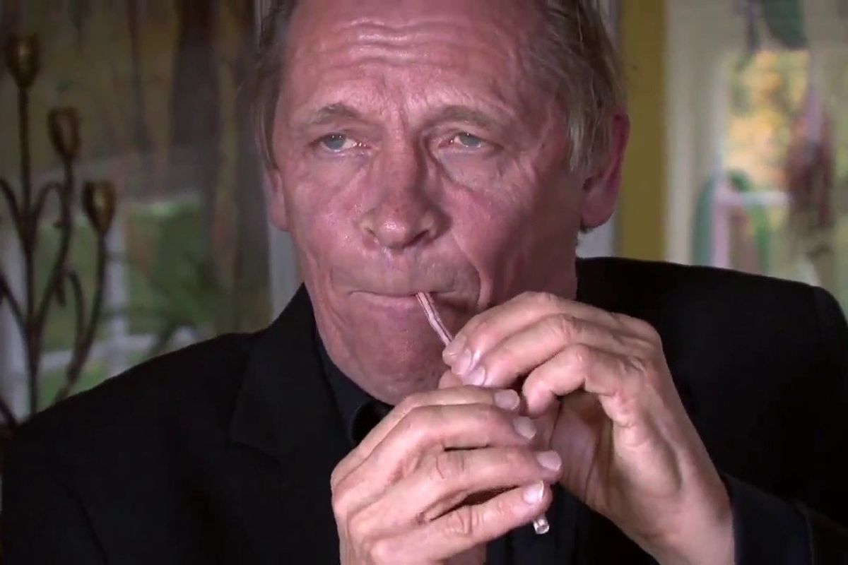 Peter Bastian playing the straw flute