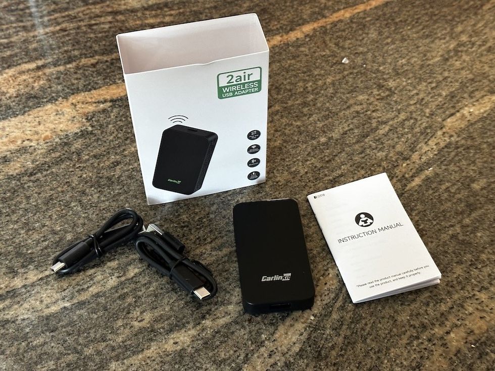 a photo of Carlinkit 2air Wireless USB Adapter unboxed