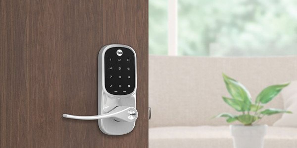 A photo of Yale Assure Lever Lock with Touchscreen on a door