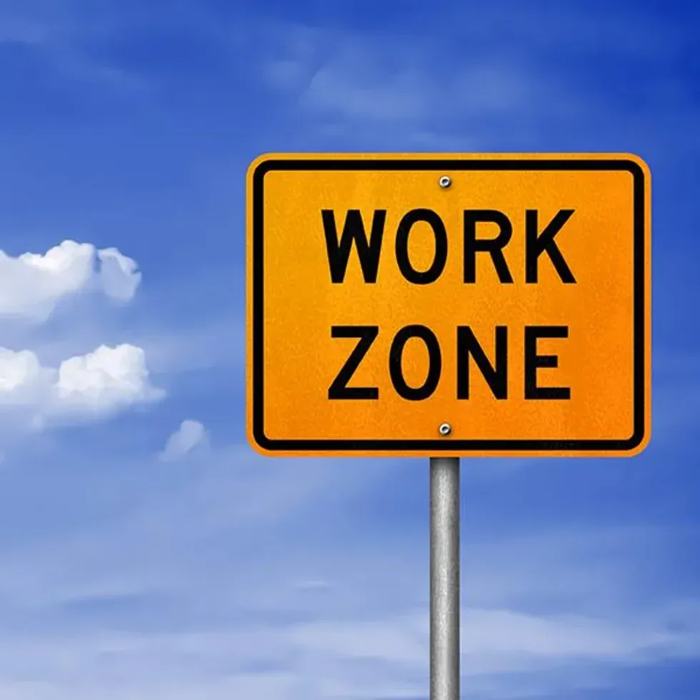 Yellow work zone sign