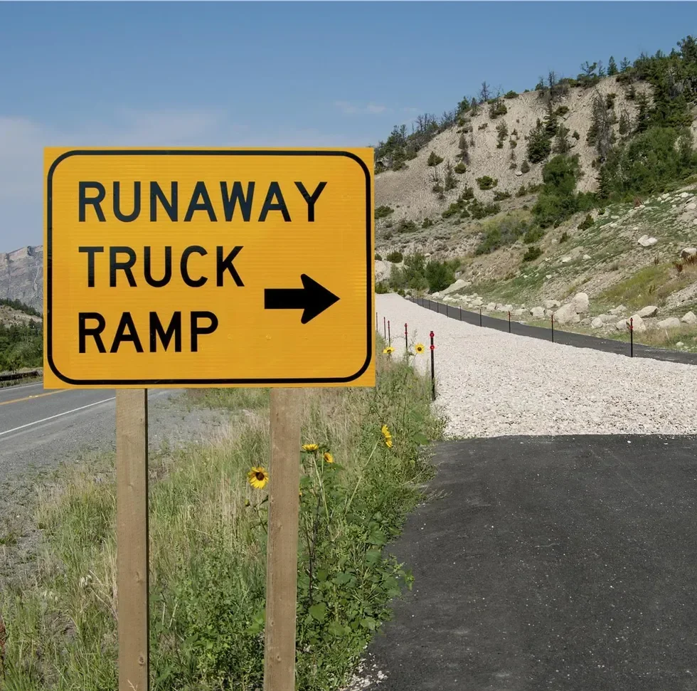 Runaway truck ramp and sign and ramp