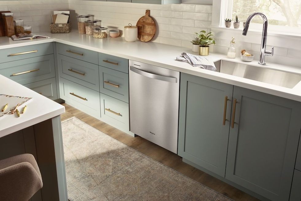 a photo of Whirlpool dishwasher installed in a kitchen.