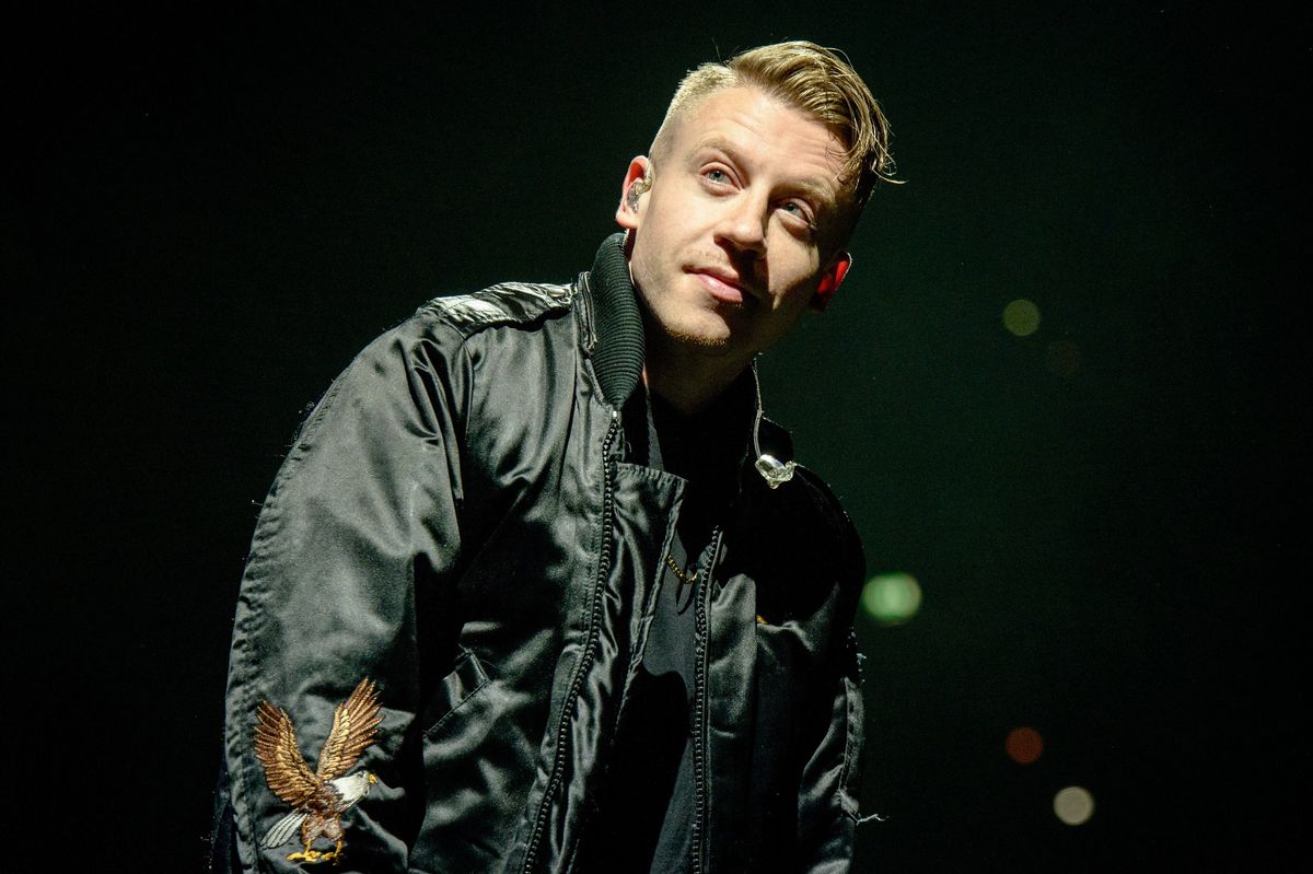 Macklemore concert; Macklemore learns lesson; girl slips Macklemore concert; life lessons