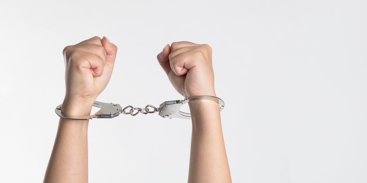 Person in handcuffs