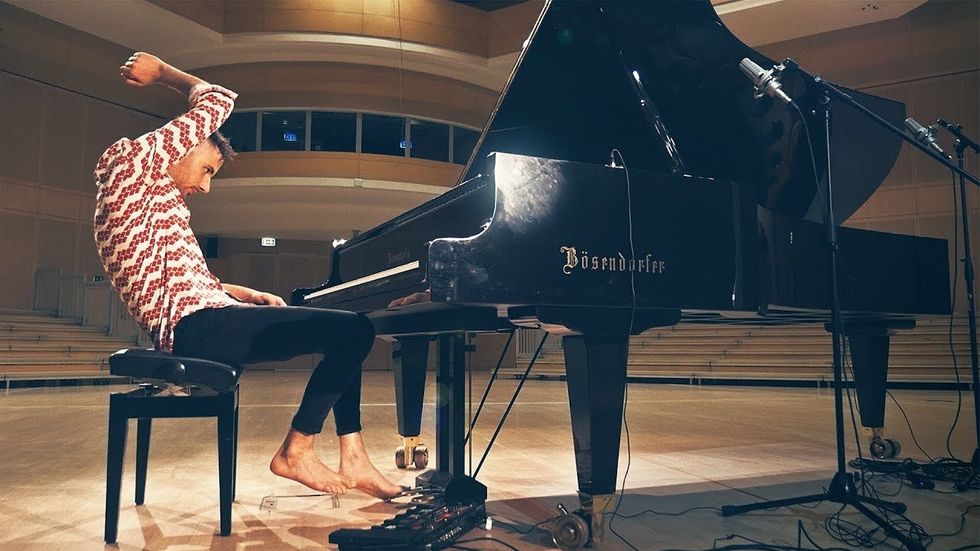 Pianist uses every part of the instrument in this joyous performance of Toto's 'Africa'