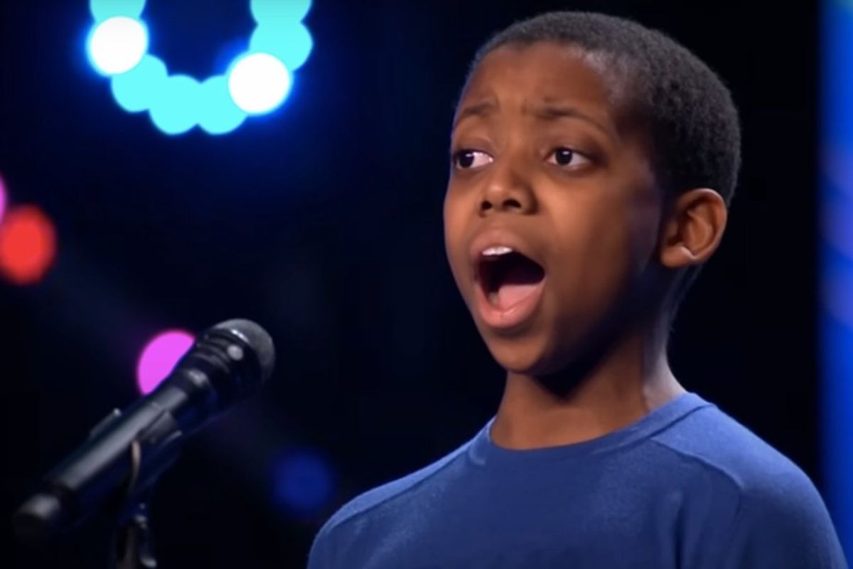 Malakai Boyah singing on stage