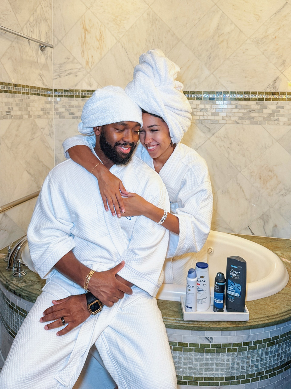 jayla-henry-tony-henry-share-an-embrace-in-bathtub-while-wearing-white-towel-turbans-and-bath-robes