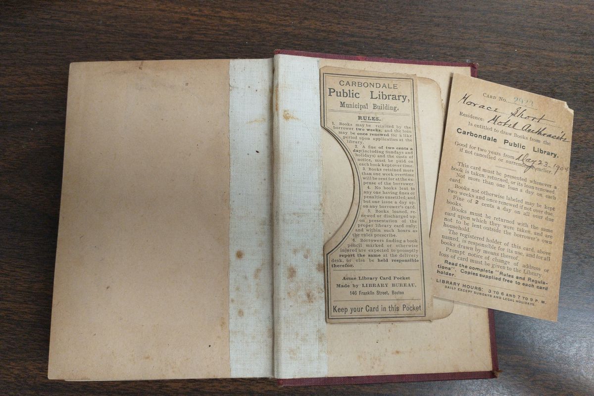 library book; carbondale public library; 120 year old library book; library book returned after 120 years