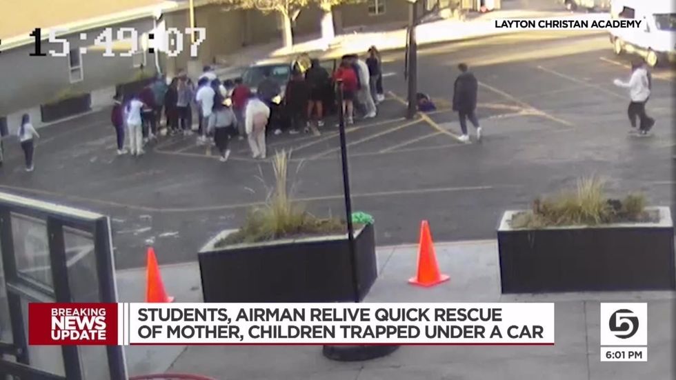 More than 20 high school students lift car to rescue mom and toddler after she was hit