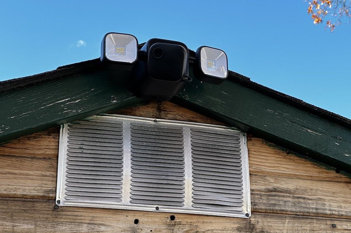 a photo of Blink Outdoor 4 Floodlight Camera Installed on a shed