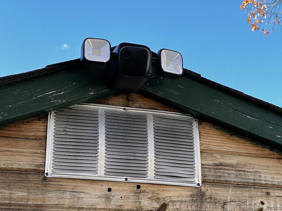 a photo of Blink Outdoor 4 Floodlight Camera Installed on a shed