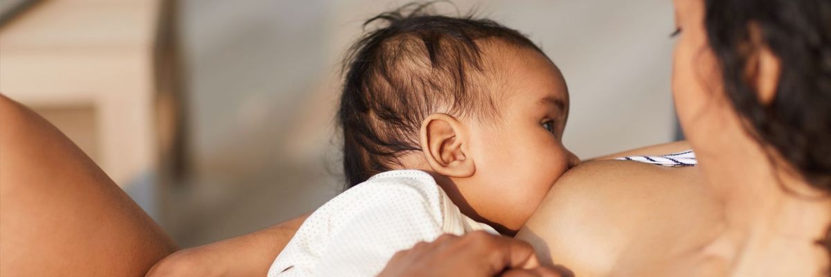 mom breastfeeding baby