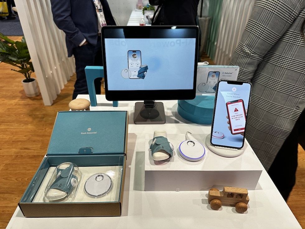 a photo of Owlet's FDA-Cleared BabySat on display at CES Show 2024