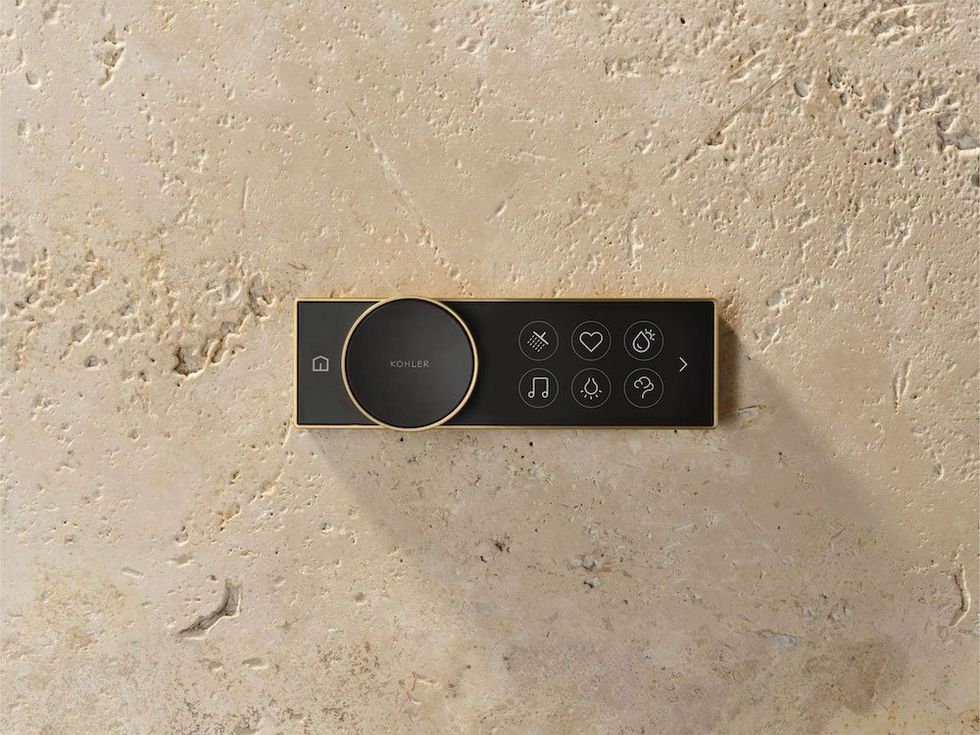 a product shot of Anthem+ Smart Showering Valves and Controls on a shower wall.