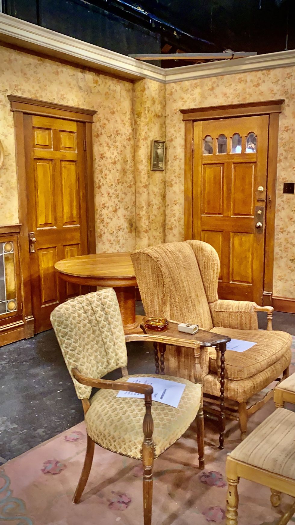 The Bunker's front door and Archie Bunker's chair.