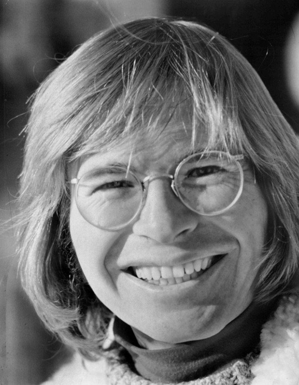 Musician John Denver smiling