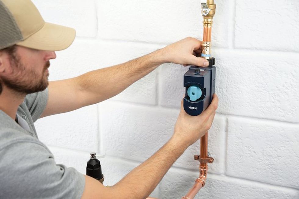 installer with Flo Smart Water Monitor and Shutoff