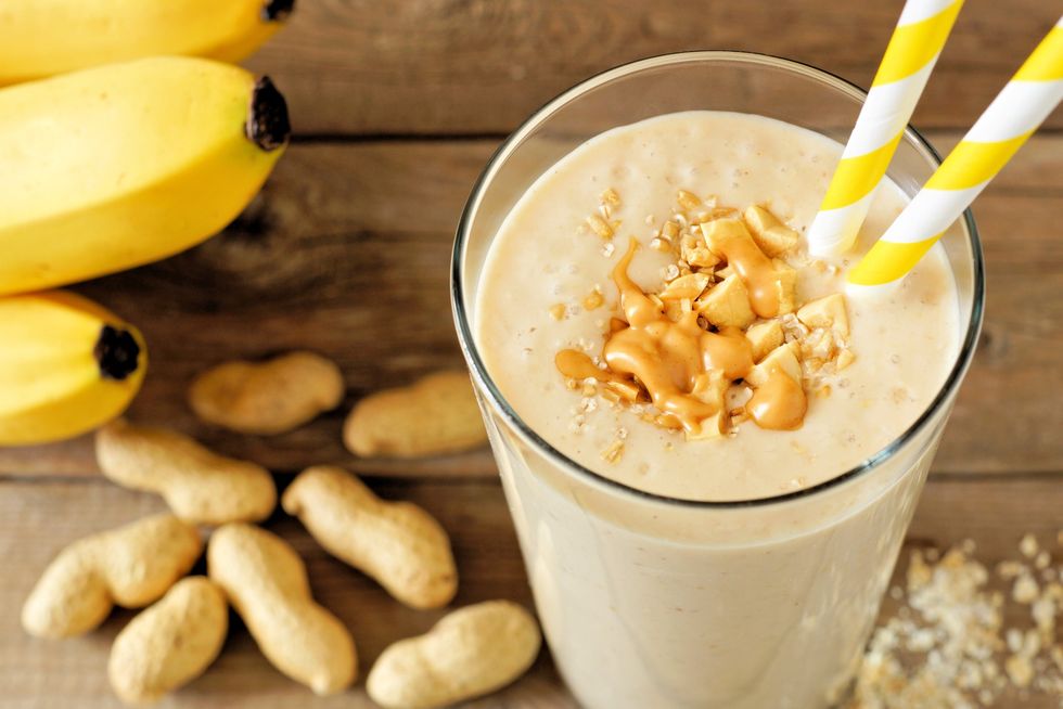 Peanut-butter-banana-smoothie-rustic-background