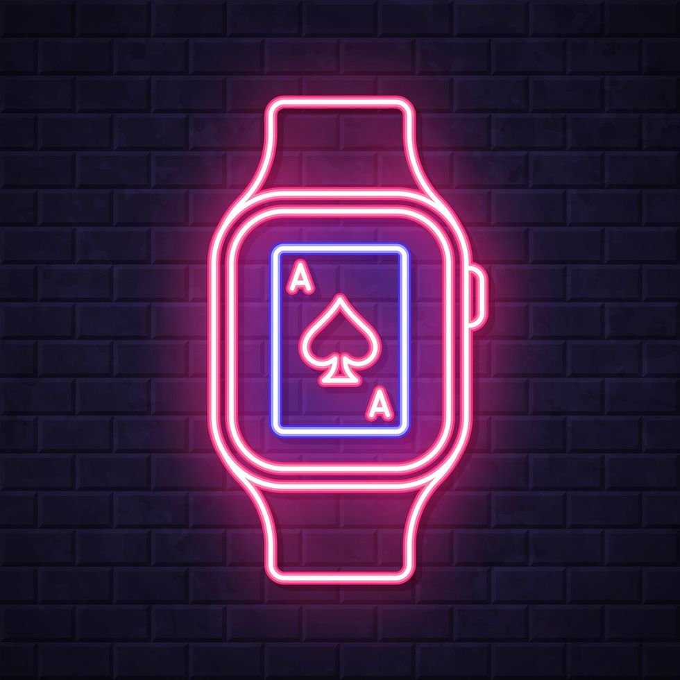 a photo of an illustrated smartwatch showing a playing card.
