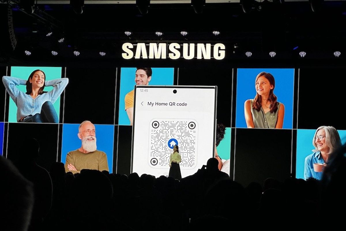 a photo of Samsung exec giving a presentation at Samsung press event at CES Show 2024 showcasing their new QR Code feature