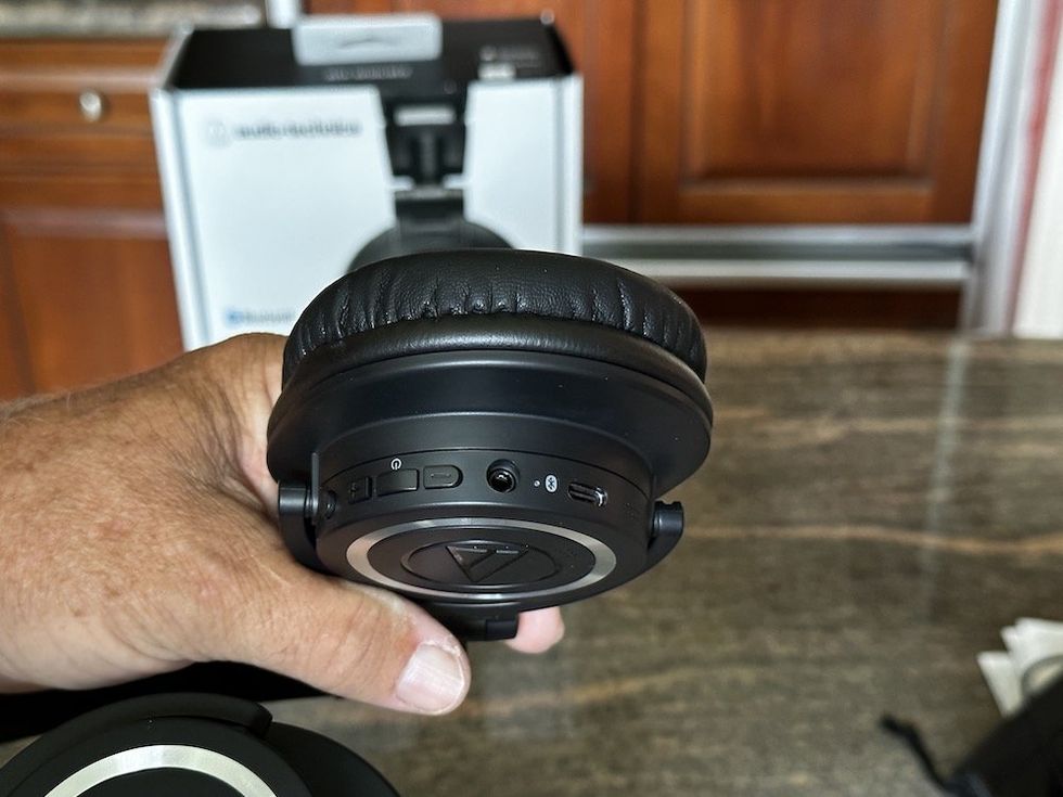 a photo of the controls on the left earcup of audio-technica ATH-M50xBT2 Wireless Headphones