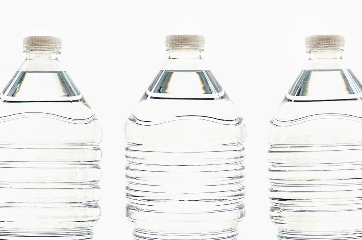 three disposable plastic water bottles