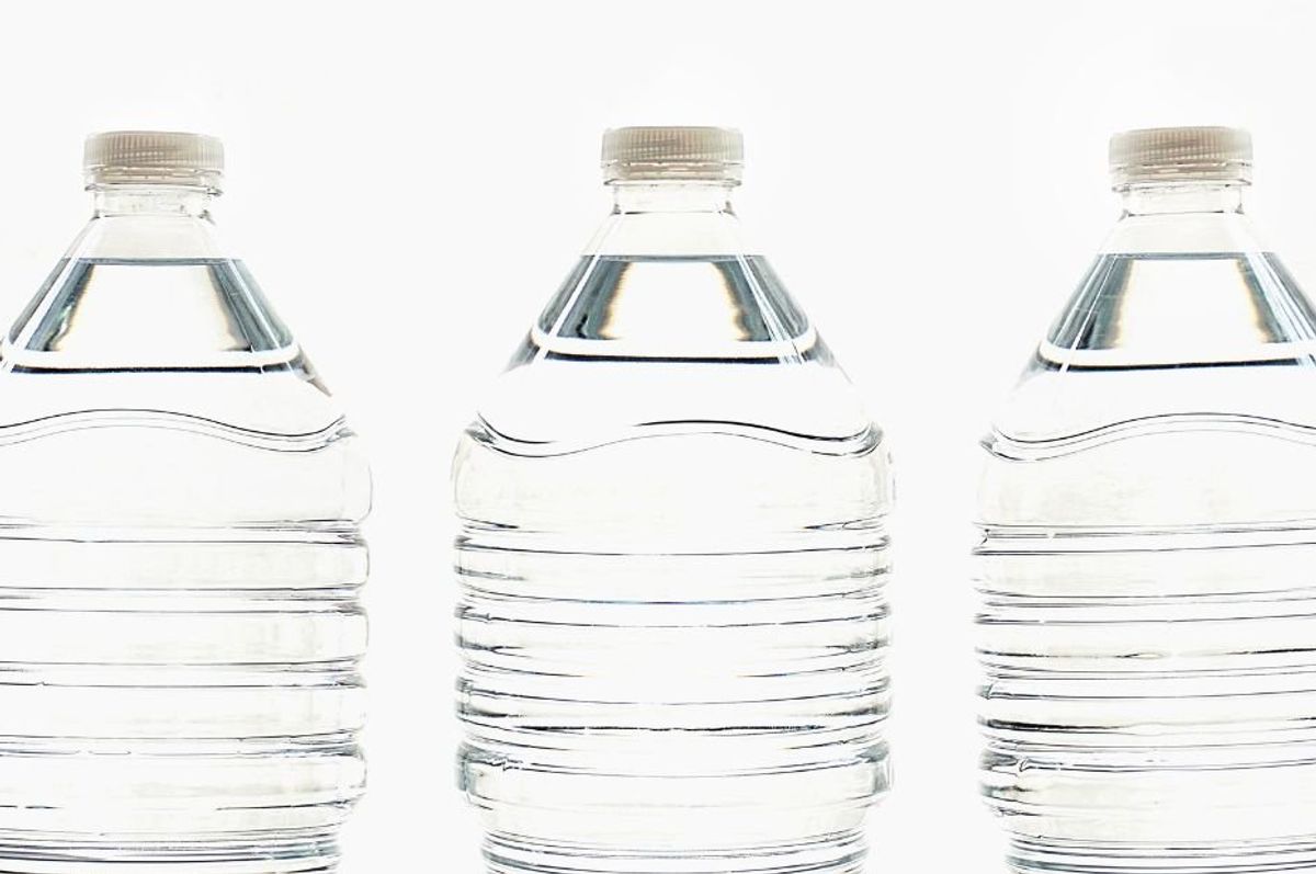 three disposable plastic water bottles