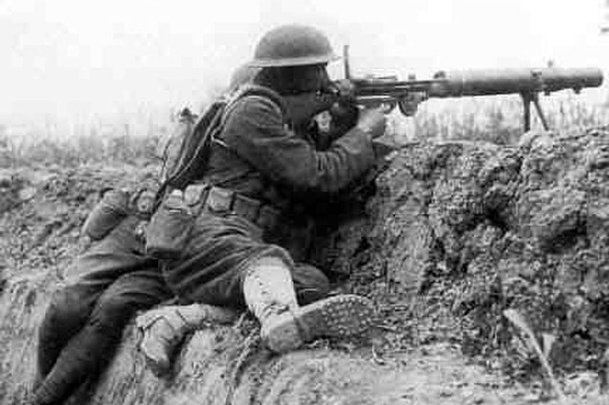 soldier in a trench with a gun in world war one