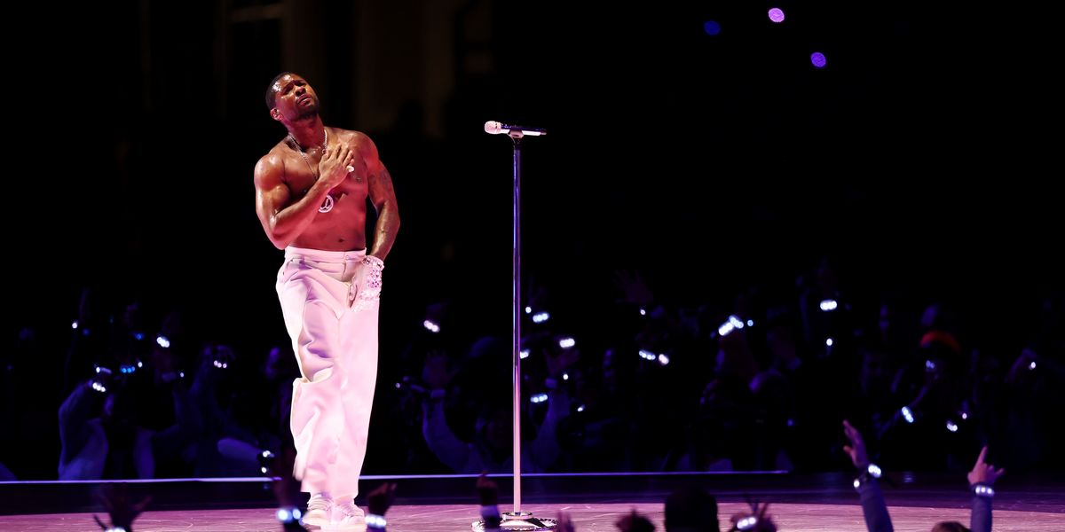Usher performing at Super Bowl LVIII Halftime Show