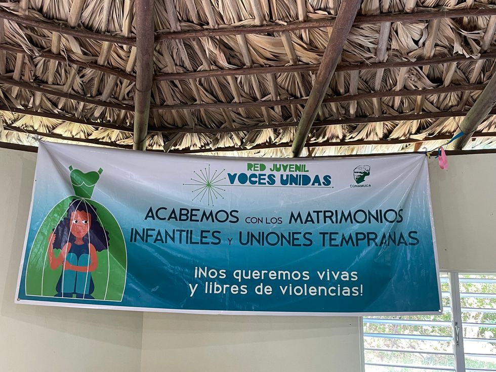 Photograph of a banner promoting women's rights in the Dominican Republic.
