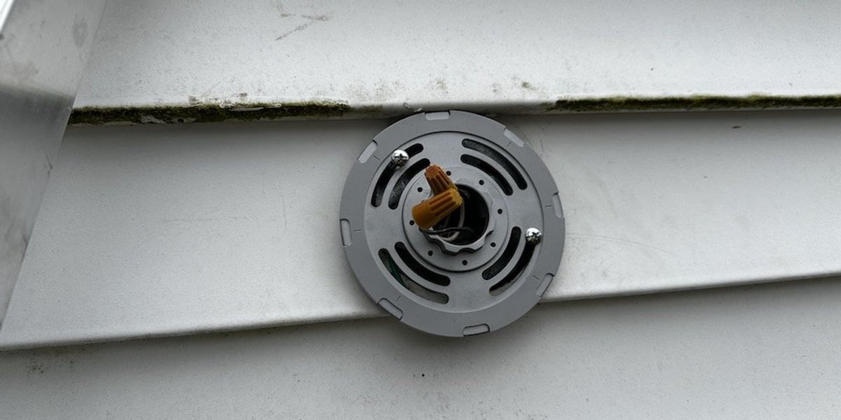 a photo of mounting bracket for Nest Floodlight cam on a house