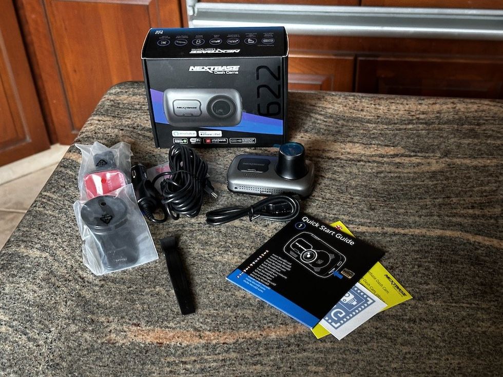 a photo of Nextbase 622GW 4K Dash Cam unboxed on a countertop