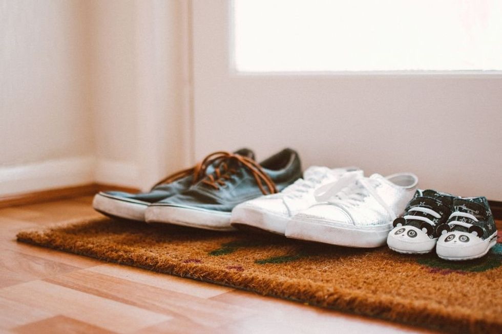 Should we wear shoes in the house? Experts weigh in and turns out we should stop immediately.