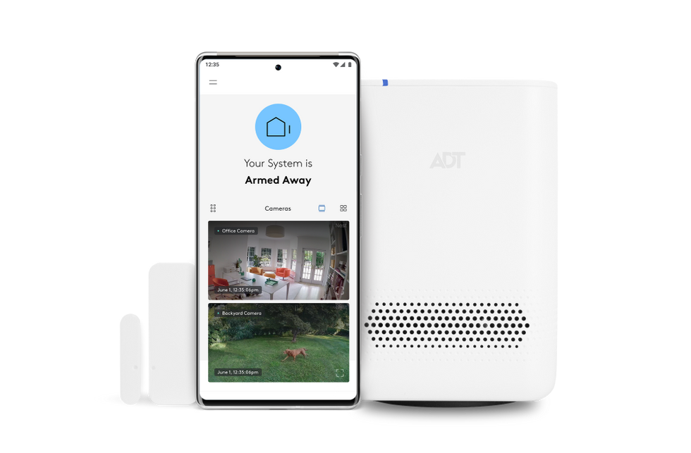 a photo of a smartphone showing ADT app and an ADT Hub next to the smartphone