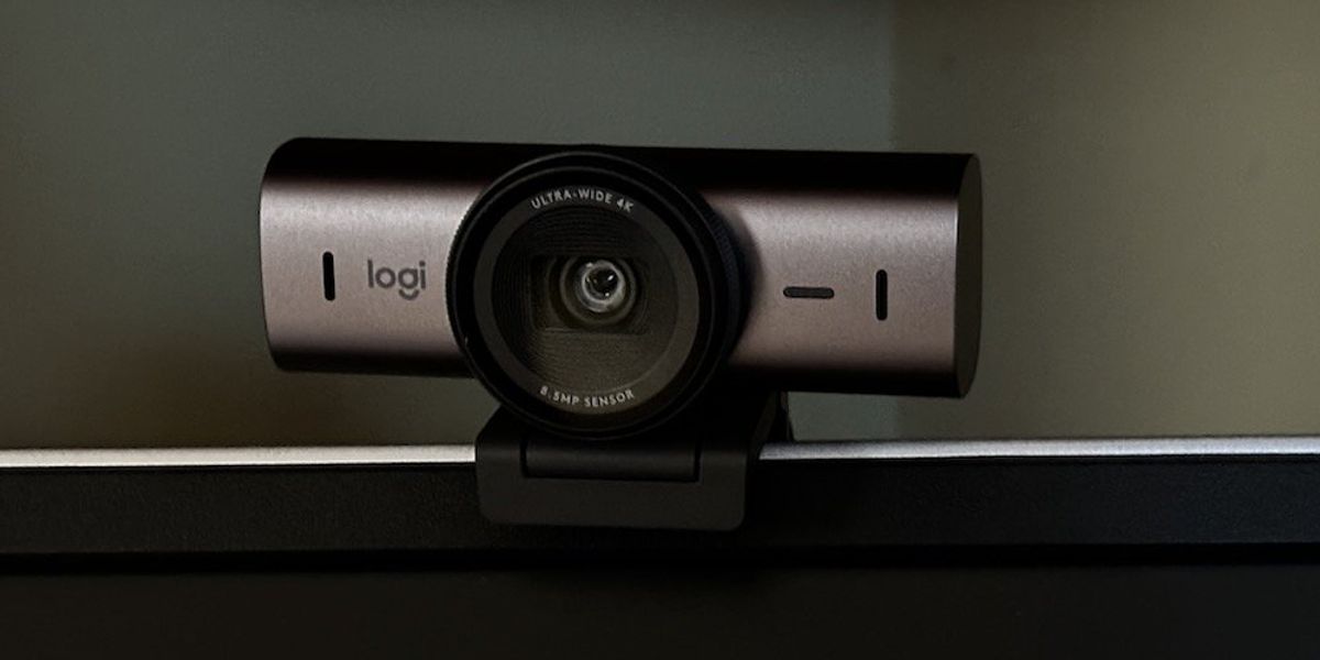 a photo of Logitech MX Brio Ultra HD 4K Webcam on a monitor