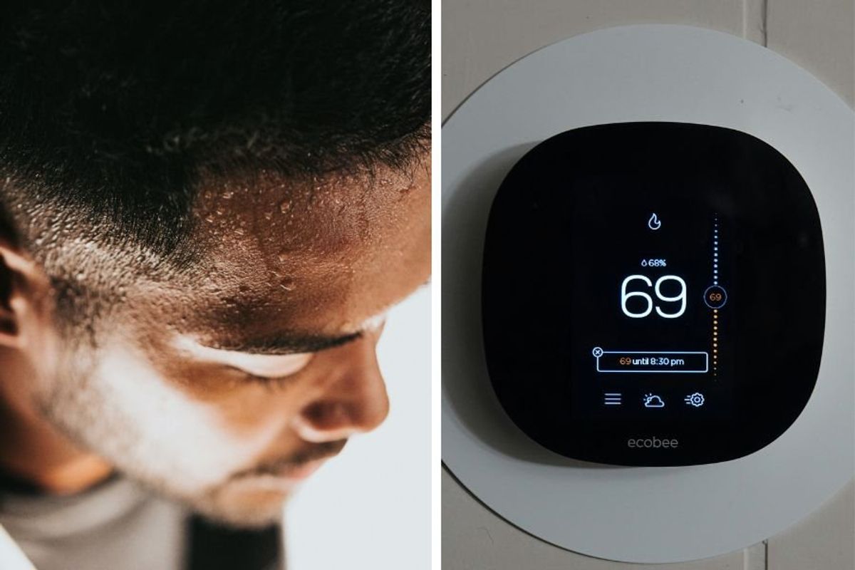 man sweating, thermostat on wall set to 69 degrees