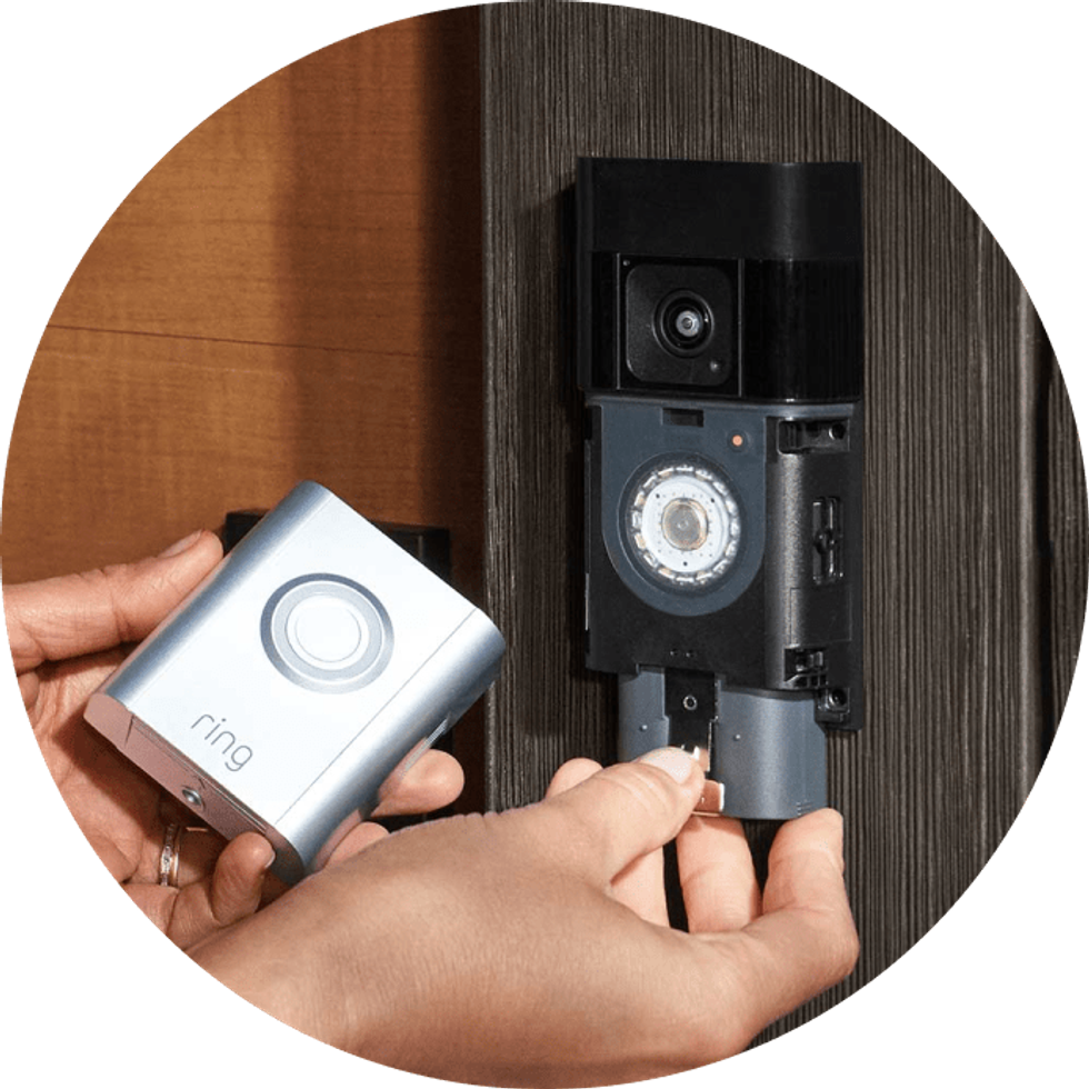 a photo of installng the battery into a Ring Battery Video Doorbell Pro