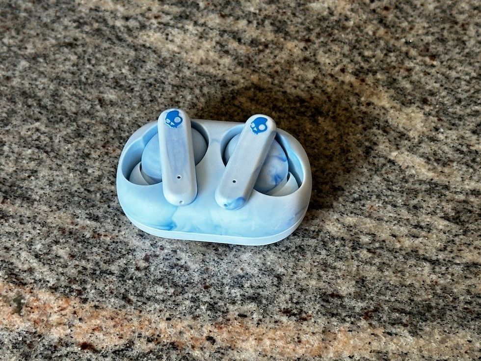 a photo of Skullcandy Ecobuds in the charging case