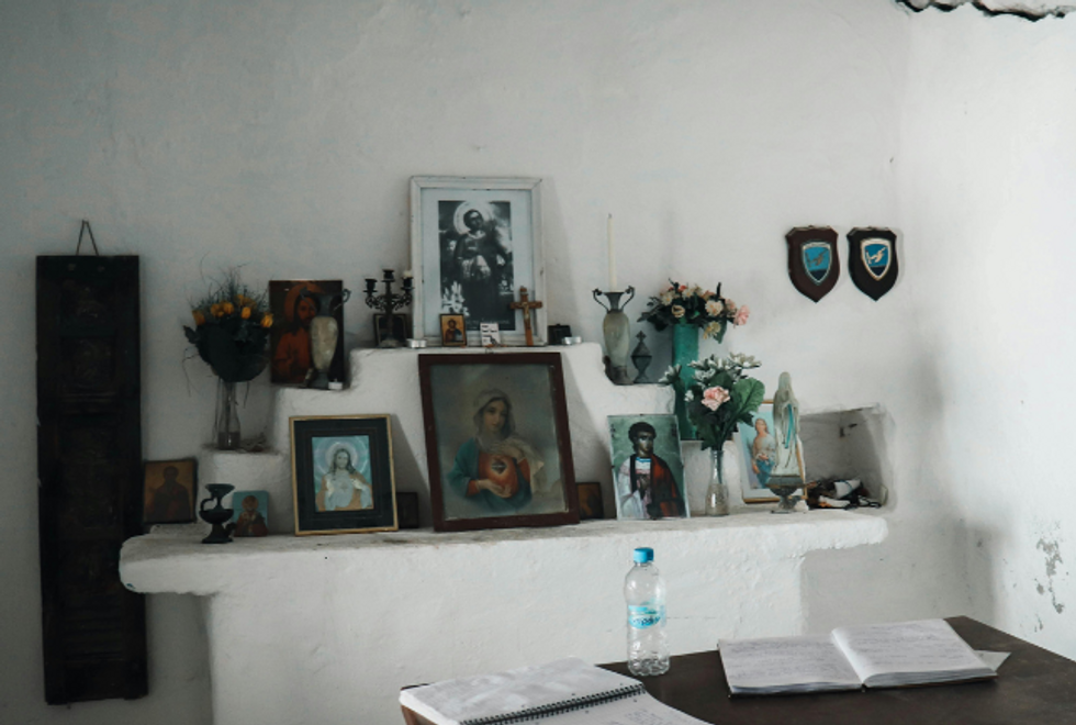 altar of religious figures Latin house