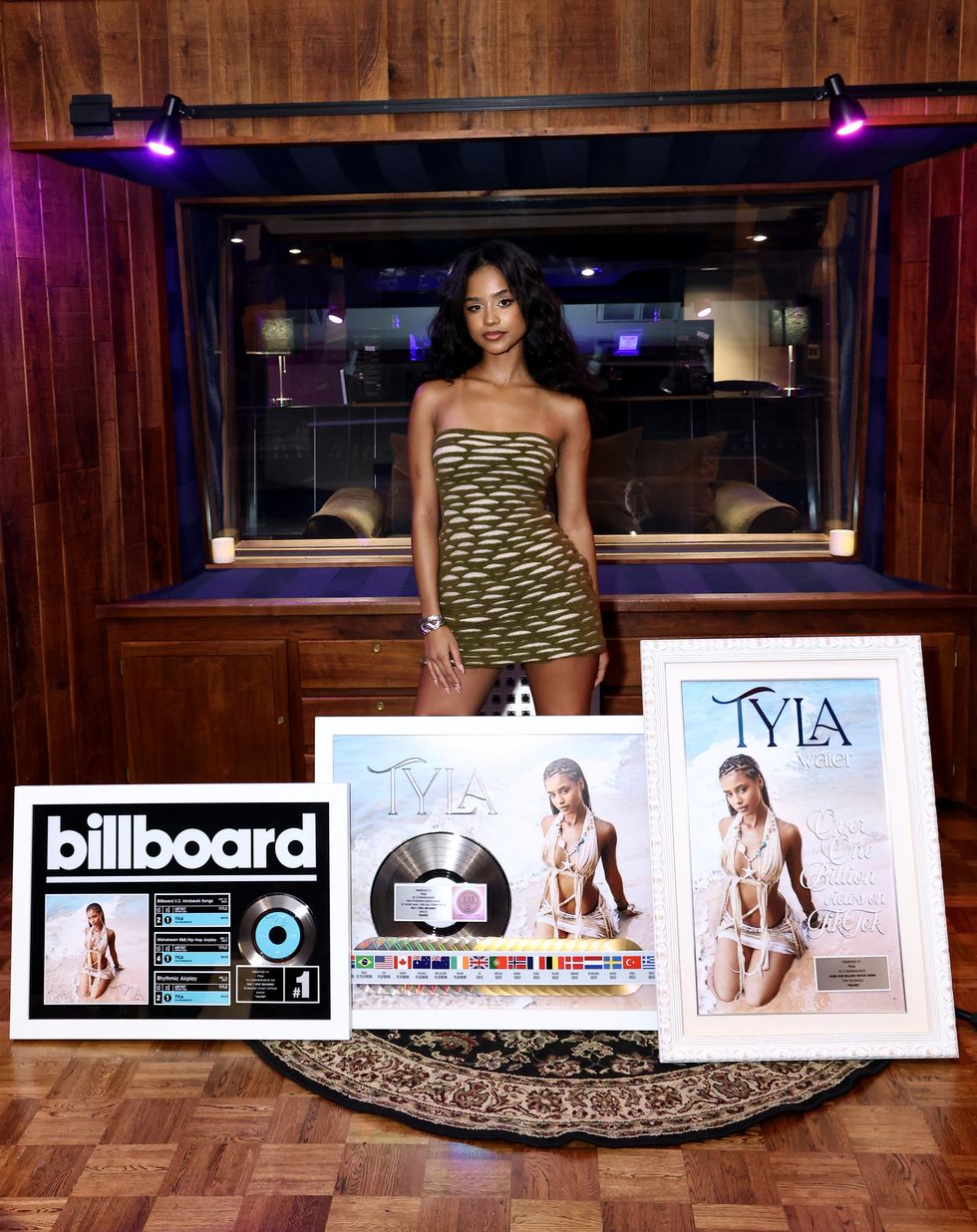 Tyla shows off her platinum plaque for "Water."