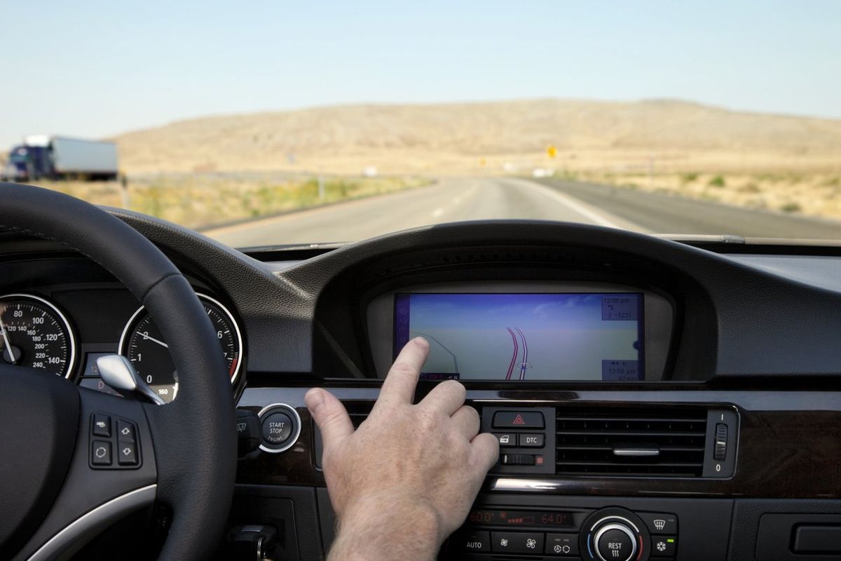 a photo of GPS navigation on a car's display while driving