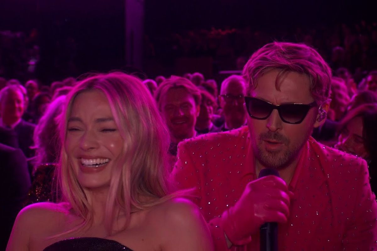 Ryan Gosling singing "I'm Just Ken" while Margot Robbie laughs