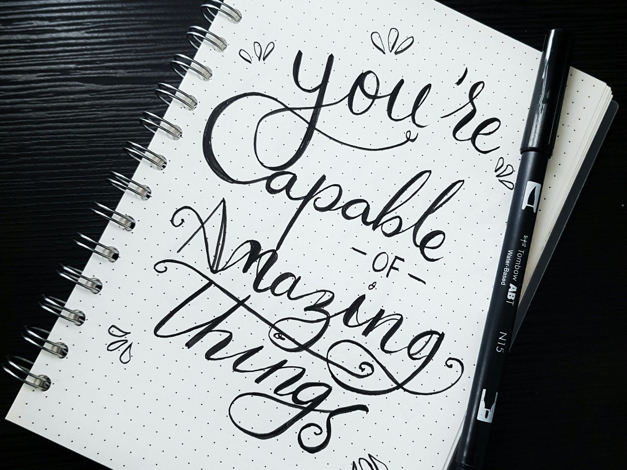 pen on you're capable of amazing things spiral notebook