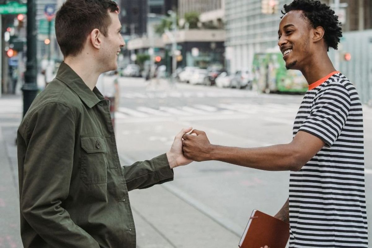 the dap; handshake; Black history; body language; history